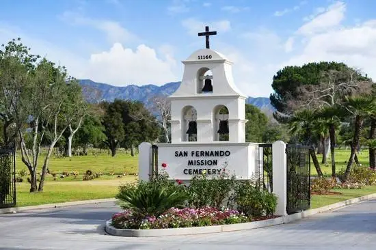 Entrance of San Fernando Mission Catholic Cemetery showcasing a peaceful and scenic resting place for loved ones.