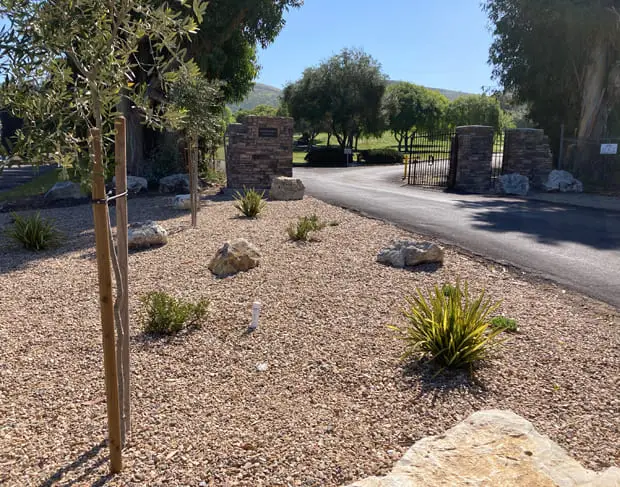 Entrance gate of Lompoc Cemetery District with landscaped surroundings
