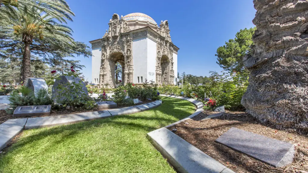 Scenic view of the historic mausoleum and memorial gardens at Pierce Brothers Valhalla Memorial Park and Mortuary in North Hollywood, CA. A peaceful setting for honoring loved ones.