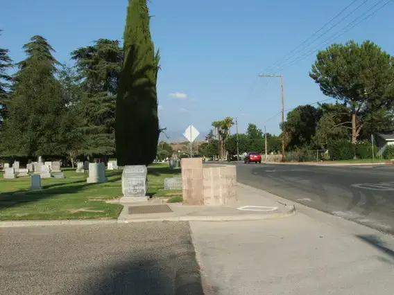 Entrance view of San Jacinto Valley Cemetery with well-maintained greenery and memorials.