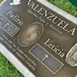 Custom bronze headstone with engraved design by Express Monument Company