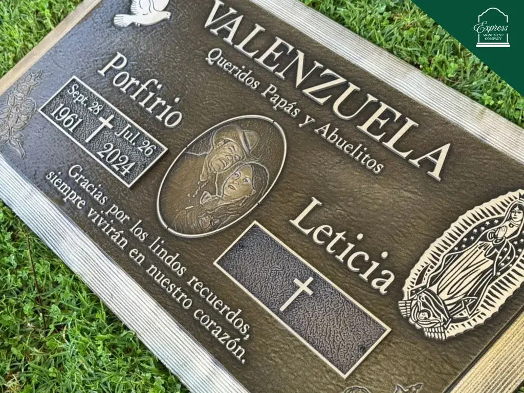 Custom bronze headstone with engraved design by Express Monument Company