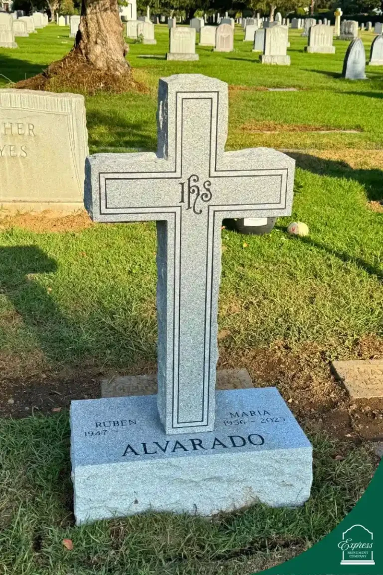 Custom granite upright monument in cross shape for the Alvarado family