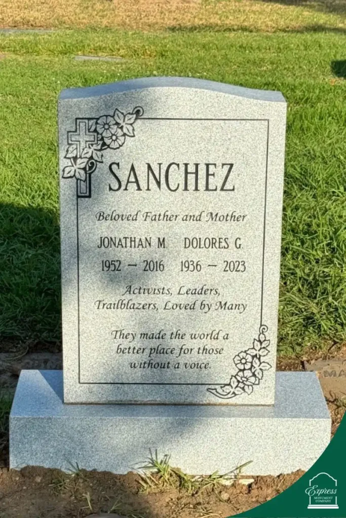 Granite upright memorial headstone for Sanchez family with engraved floral and cross design