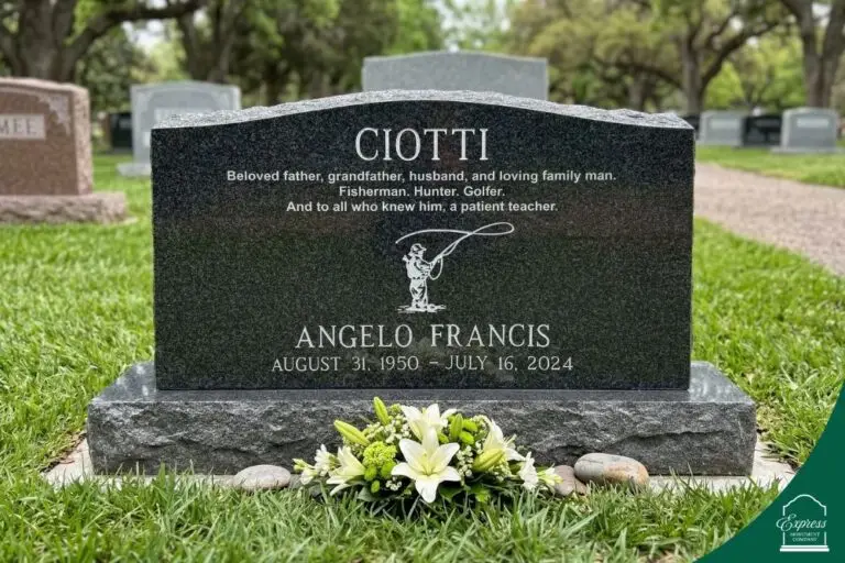 Black granite upright headstone for Angelo Francis Ciotti with engraved design and inscription