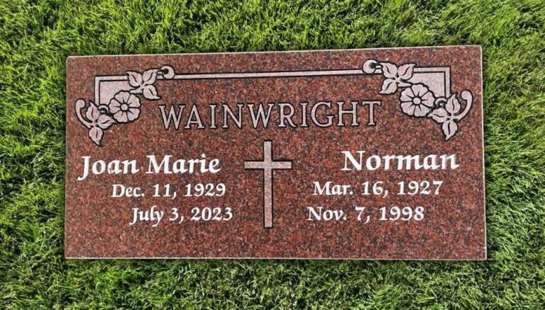 red-granite-flat-headstone-double-marker-floral-design