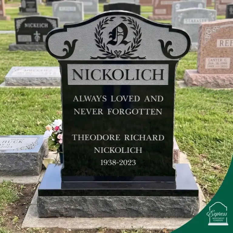 Black granite upright monument for Theodore Richard Nickolich with engraved family name