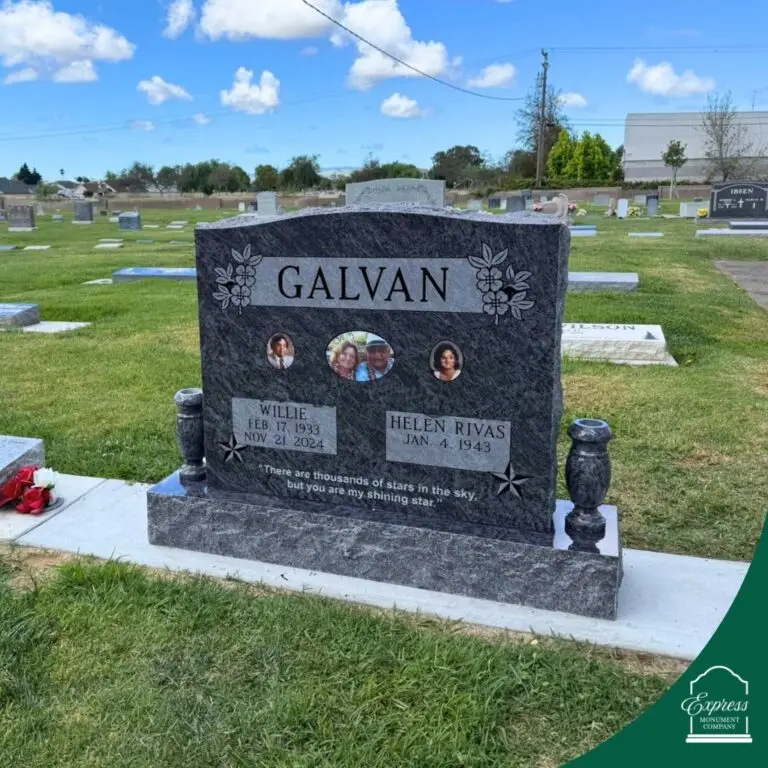 Gray granite upright family monument for Galvan family with floral engraving and portraits