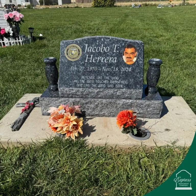 Gray granite upright monument for Jacobo T Herrera with portrait and memorial emblem